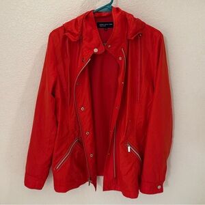 Jones New York red wind breaker style jacket with silver button detailing.